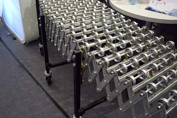 Роликовый телескопический конвейер